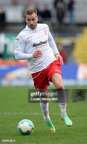 Romas Dressler of Regensburg controles the ball during the Third League match between Jahn Regensburg and Preussen Muenster at Jahnstadion on March...