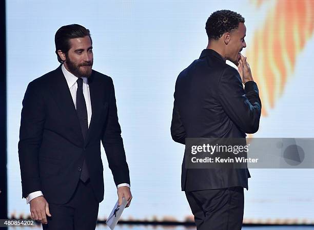 Player Stephen Curry accepts the award for Best Male Athlete from actor Jake Gyllenhaal onstage during The 2015 ESPYS at Microsoft Theater on July...