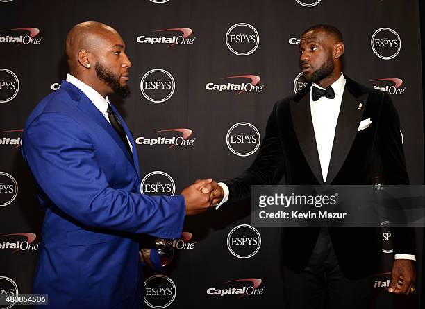 Player Devon Still with NBA player Lebron James with the Jimmy V Award for Perseverance at The 2015 ESPYS at Microsoft Theater on July 15, 2015 in...
