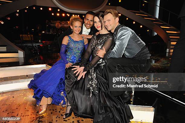 Melanie Binder, Danilo Campisi, Roxanne Rapp and Vadim Garbuzov pose for a photograph during the 'Dancing Stars' TV Show after party at ORF Zentrum...