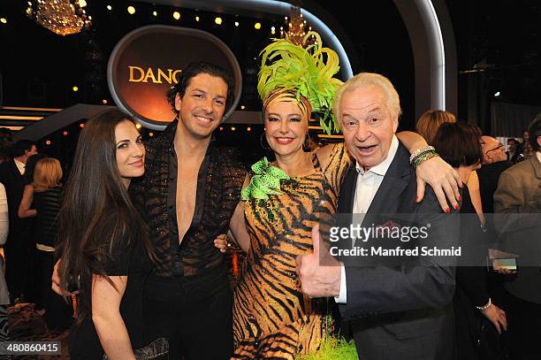 Thomas Kraml, Andrea Buday and Harald Serafin pose for a photograph during the 'Dancing Stars' TV Show after party at ORF Zentrum on March 21, 2014...