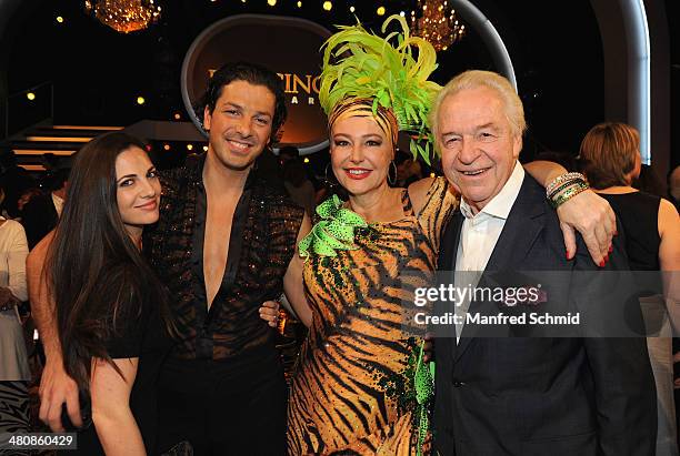 Thomas Kraml, Andrea Buday and Harald Serafin pose for a photograph during the 'Dancing Stars' TV Show after party at ORF Zentrum on March 21, 2014...