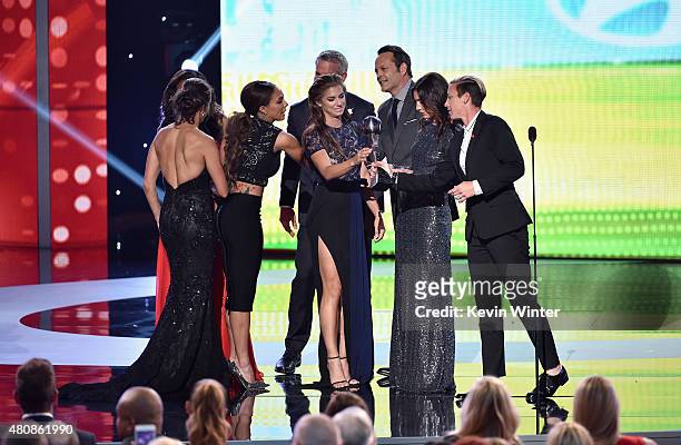 Soccer players Sydney Leroux, Alex Morgan, Hope Solo and Abby Wambach of The U.S. Women's National Soccer team accept the award for Best Team from...