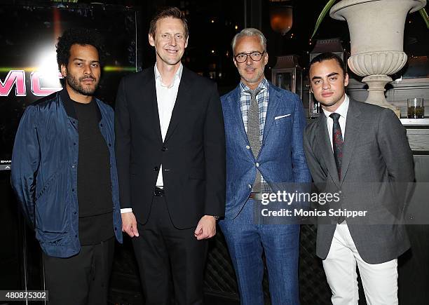 Twin Shadow, Duncan Aldred, fashion designer Michael Bastian, and photographer Michael Avedon attend the Michael Bastian + GMC Dinner during New York...