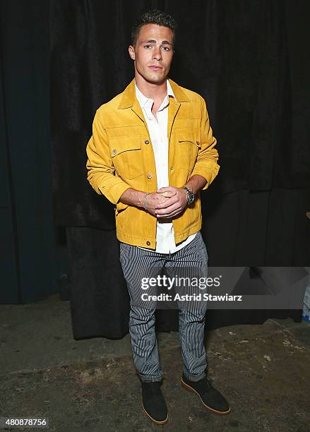 Actor Colton Haynes wearing clothing designed by Billy Reid poses backstage at Billy Reid - New York Fashion Week: Men's S/S 2016at Art Beam on July...