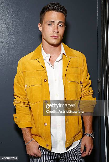 Actor Colton Haynes wearing clothing designed by Billy Reid poses backstage at Billy Reid - New York Fashion Week: Men's S/S 2016at Art Beam on July...