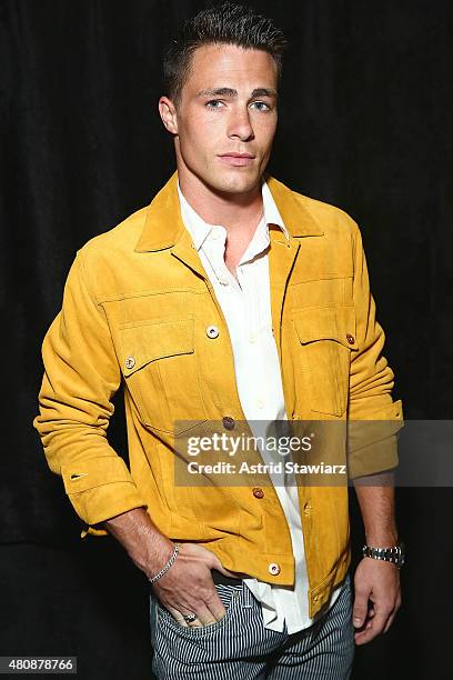 Actor Colton Haynes wearing clothing designed by Billy Reid poses backstage at Billy Reid - New York Fashion Week: Men's S/S 2016at Art Beam on July...