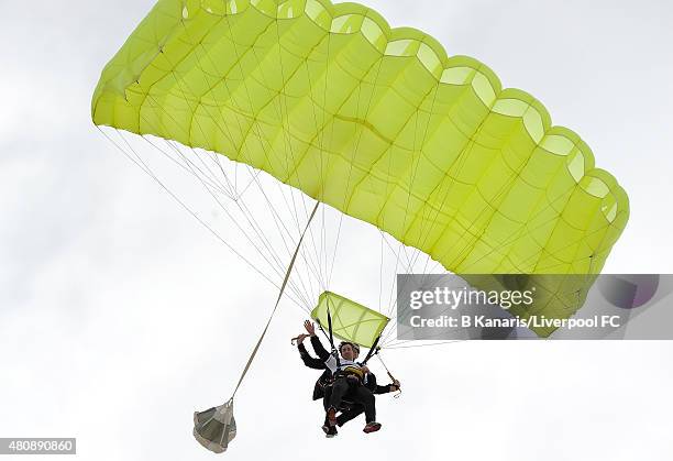 Robbie Fowler sky dives onto Kirra Beach in the new Liverpool away jersey on July 16, 2015 at the Gold Coast, Australia.