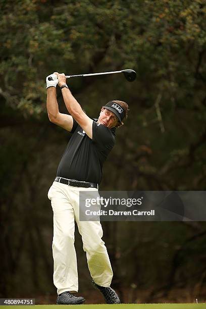 Phil Mickelson tees off on the 14th tee during Round One of the Valero Texas Open at the AT&T Oaks Course on March 27, 2014 in San Antonio, Texas.