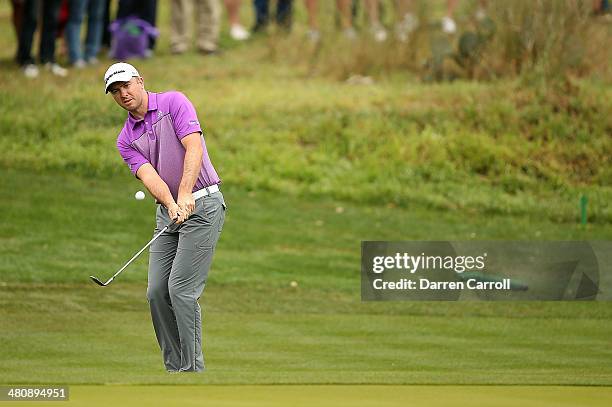 Phil Martin Laird plays a shot on the 13th during Round One of the Valero Texas Open at the AT&T Oaks Course on March 27, 2014 in San Antonio, Texas.