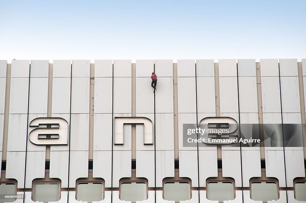 Alain Robert Climbs The Ariane Tower