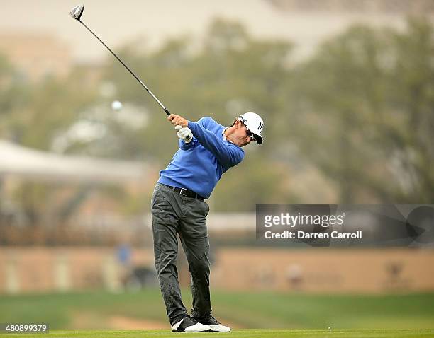 Scott Langley tees off for the third time on the 11th during Round One of the Valero Texas Open at the AT&T Oaks Course on March 27, 2014 in San...