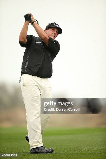 Phil Mickelson plays a shot on the 10th during Round One of the Valero Texas Open at the AT&T Oaks Course on March 27, 2014 in San Antonio, Texas.