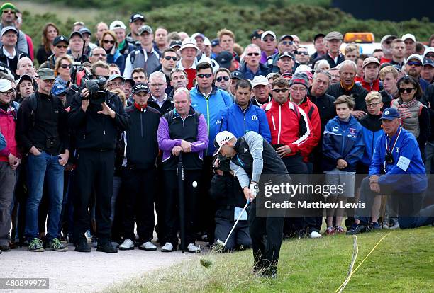 Sergio Garcia of Spain plays his second shot out of the rough on the 4th hole during the first round of the 144th Open Championship at The Old Course...