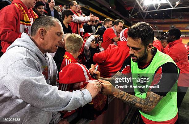 Danny Ings of Liverpool signing fans shirts at the end of a training session at Suncorp Stadium on July 16, 2015 in Brisbane, Australia.