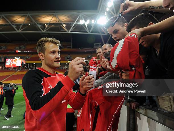Simon Mignolet of Liverpool signing fans shirts at the end of a training session at Suncorp Stadium on July 16, 2015 in Brisbane, Australia.