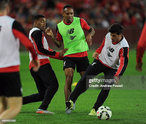 Jordon Ibe, Nathaniel Clyne and Joao Teixeira of Liverpool in action during a training session at Suncorp Stadium on July 16, 2015 in Brisbane,...