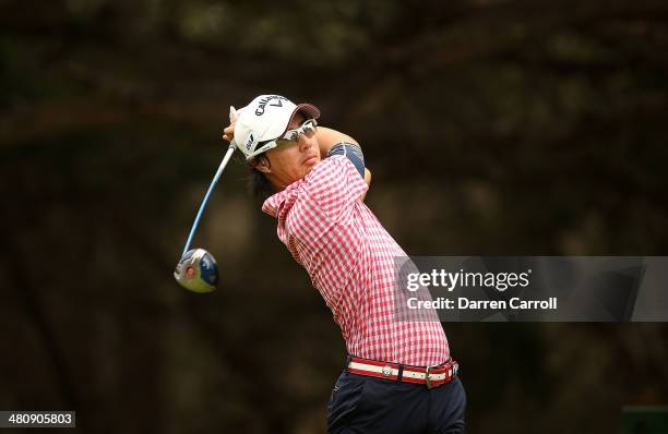 Ryo Ishikawa tees off on the 14th during Round One of the Valero Texas Open at the AT&T Oaks Course on March 27, 2014 in San Antonio, Texas.