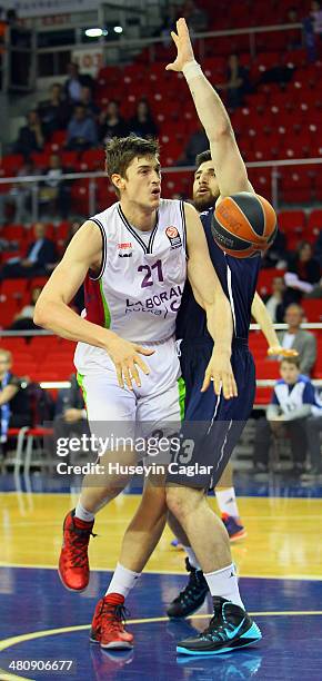 Tibor Pleiss, #21 of Laboral Kutxa Vitoria competes with Deniz Kilicli, #13 of Anadolu Efes Istanbul in action during the 2013-2014 Turkish Airlines...