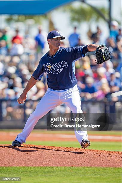 Grant Balfour of the Tampa Bay Rays pitches against the Minnesota Twins on March 2, 2014 at Charlotte Sports Park in Port Charlotte, Florida.