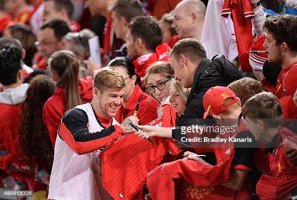 Alberto Moreno signs autographs for fans during a Liverpool FC training session at Suncorp Stadium on July 16, 2015 in Brisbane, Australia.