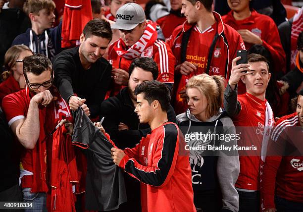 Joao Carlos Teixeira signs autographs for fans during a Liverpool FC training session at Suncorp Stadium on July 16, 2015 in Brisbane, Australia.