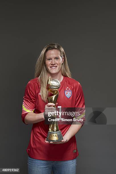 World Cup Champions: Portrait of US Women's National Team goalie Alyssa Naeher holding trophy during photo shoot at ABC News' Good Morning America...