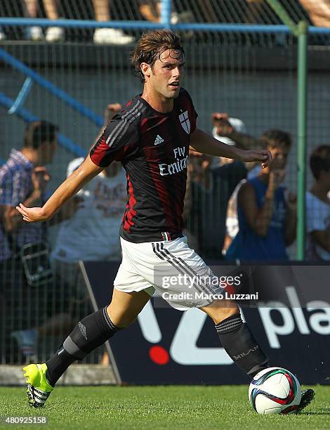 Andrea Poli of AC Milan in action during the preseason friendly match between AC Milan and Legnano on July 14, 2015 in Solbiate Arno, Italy.