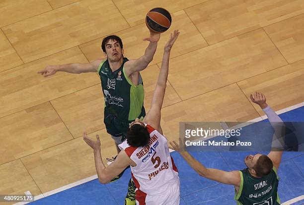 Carlos Suarez, #12 of Unicaja Malaga in action during the 2013-2014 Turkish Airlines Euroleague Top 16 Date 12 game between Unicaja Malaga v...