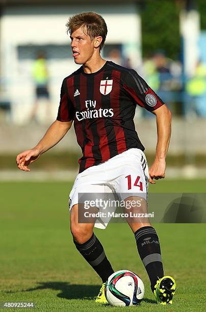 Michelangelo Albertazzi of AC Milan in action during the preseason friendly match between AC Milan and Legnano on July 14, 2015 in Solbiate Arno,...