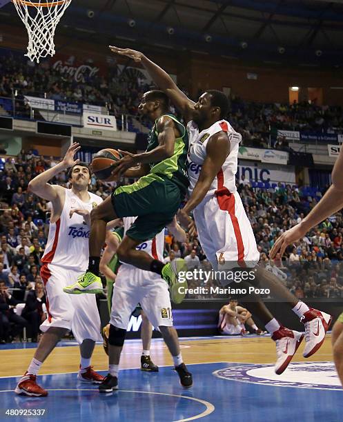 Earl Calloway, #11 of Unicaja Malaga in action during the 2013-2014 Turkish Airlines Euroleague Top 16 Date 12 game between Unicaja Malaga v...