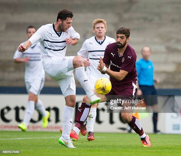 Lewis Toshney of Raith Rovers gets better of Juanma Delgado of Hearts during the Pre Season Friendly between Raith Rovers and Hearts at Starks Park...