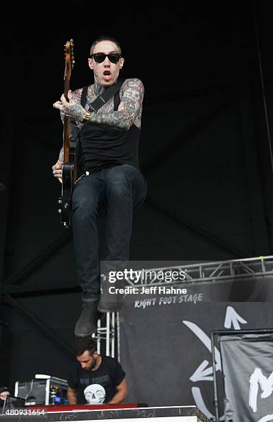 Singer Trace Cyrus of Metro Station performs at PNC Music Pavilion on July 7, 2015 in Charlotte, North Carolina.