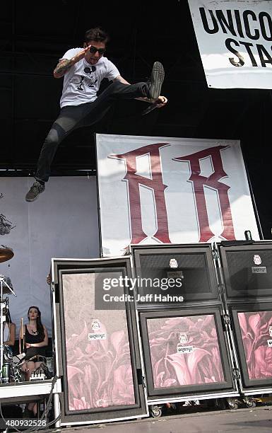 Singer Kyle Pavone of We Came as Romans performs at PNC Music Pavilion on July 7, 2015 in Charlotte, North Carolina.