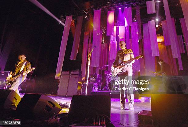 Jack Bates, Jimmy Chamberlin, Billy Corgan and Jeff Schroeder of The Smashing Pumpkins perform onstage during the 'The End Times Tour' opener at...