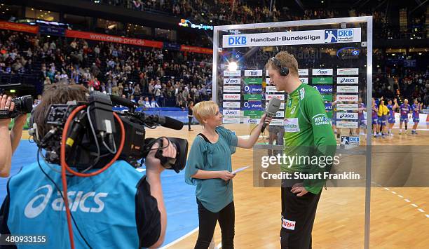 Johannes Bitter of Hamburg handball team during an interview with Anett Sattler of Sport 1 at the DKB Bundesliga handball match between HSV Handball...