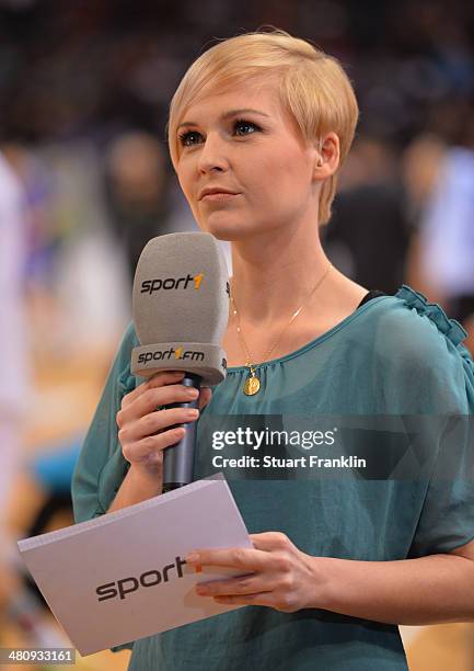 Anett Sattler, handball reporter for Sport 1 at the DKB Bundesliga handball match between HSV Handball and Fuechse Berlin at O2 World on March 27,...