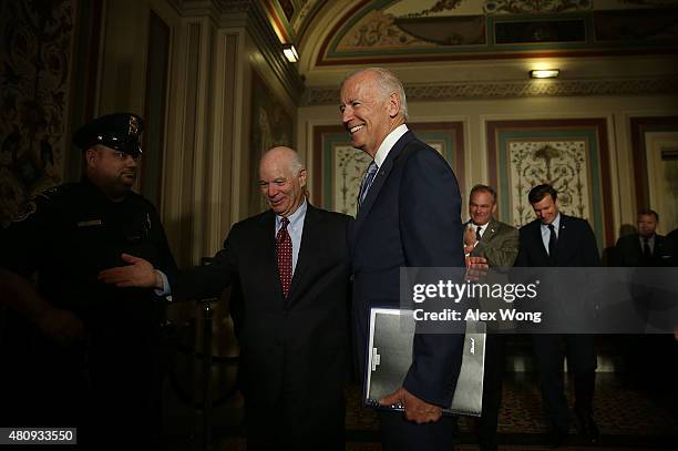 Vice President Joseph Biden arrives at a meeting with Senate Foreign Relations Committee members as he is welcomed by Sen. Ben Cardin July 16, 2015...