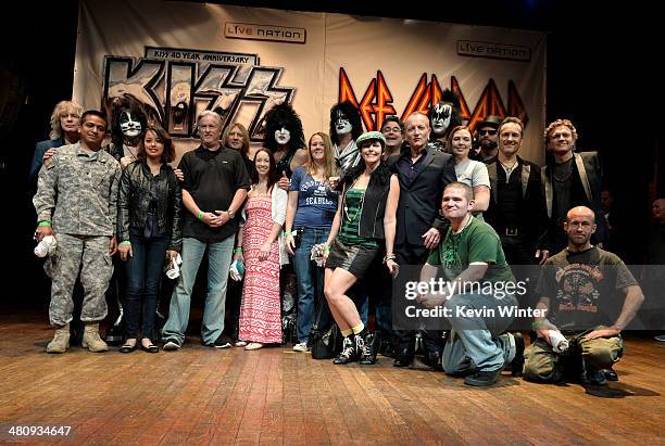 Musicians Eric Singer, Paul Stanley, Rick Allen, Joe Elliott, Phil Collen, Rick Savage, Gene Simmons, Vivian Campbell and Tommy Thayer of KISS and...