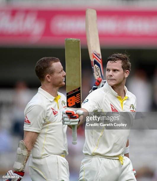 Australian unbeaten batsmen Chris Rogers and Steven Smith of Australia leave the field at the end of day one of the 2nd Investec Ashes Test match...