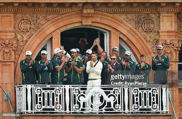 The Australian Team celebrate as Chris Rogers and Steve Smith of Australia leave the ground at stumps during day one of the 2nd Investec Ashes Test...