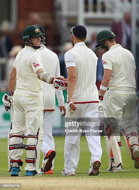 Chris Rogers of Australia is congratulated by Mark Wood of England during day one of the 2nd Investec Ashes Test match between England and Australia...