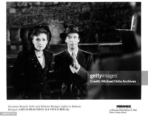 Actor Roberto Benigni and actress Nicoletta Braschi in a scene from the Miramax movie "Life Is Beautiful" circa 1997.