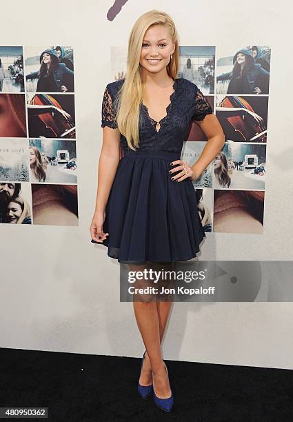 Actress Olivia Holt arrives at the Los Angeles Premiere "If I Stay" at TCL Chinese Theatre on August 20, 2014 in Hollywood, California.