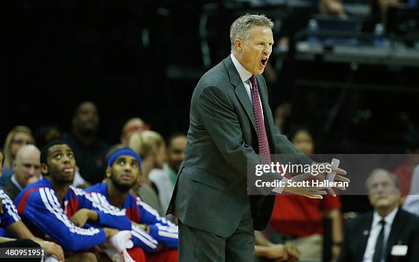 Head coach Brett Brown of the Philadelphia 76ers reacts to a play during the game against the Houston Rockets at the Toyota Center on March 27, 2014...