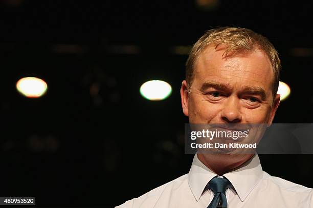 New Liberal Democrat Party Leader Tim Farron looks on as he gives a speech as he becomes the new leader of the party at Islington Assembly Hall on...