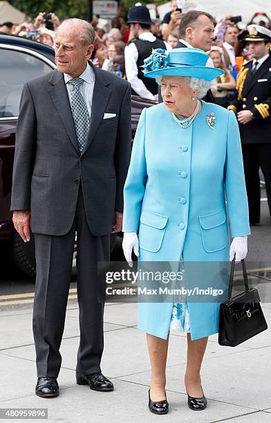 Queen Elizabeth II and Prince Philip, Duke of Edinburgh arrive for a visit to the Broadway Theatre during a day of engagements in the London Borough...