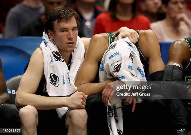 Brady Heslip and Isaiah Austin of the Baylor Bears sit on the bench late in the second half while taking on the Wisconsin Badgers during the regional...
