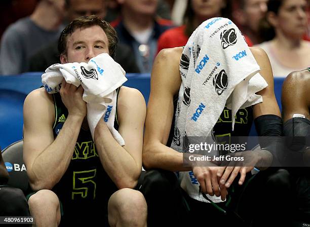 Brady Heslip and Isaiah Austin of the Baylor Bears sit on the bench late in the second half while taking on the Wisconsin Badgers during the regional...