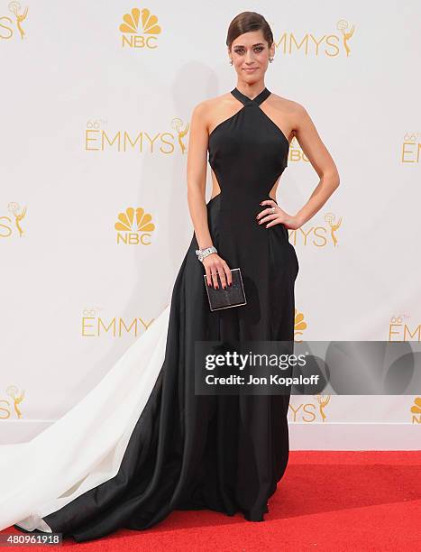 Actress Lizzy Caplan arrives at the 66th Annual Primetime Emmy Awards at Nokia Theatre L.A. Live on August 25, 2014 in Los Angeles, California.